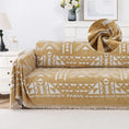 Load image into Gallery viewer, topspet Premium Couch Cover Blanket in tan with white geometric pattern and fringed edges on sofa