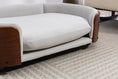 Load image into Gallery viewer, Scandinavian style elevated dog bed by Home Furnishers with solid wood legs and light gray upholstery.