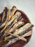 Load image into Gallery viewer, Smelt (Wild Caught) dried fish, Naked Beasts brand, in a brown bowl