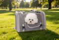 Bild in Galerie-Betrachter laden, Mr. Peanut's Monterey Series airline-compliant horizontal backpack pet carrier, gray fabric, dog peeking out.