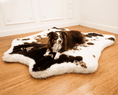 Load image into Gallery viewer, PupRug Animal Print Memory Foam Dog Bed - Brown Faux Cowhide, Paw.com, dog resting on it.