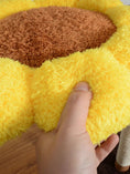 Load image into Gallery viewer, Hand pressing a yellow fabric petal beside the brown center of a Solana Sunflower Cat Tree perch