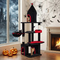 Charger l'image dans la visionneuse de la galerie, 63 Inch Gothic Cat Tree by DirectDeals; black/red, condo/top cave, two cats in cubbies, three pumpkins nearby.
