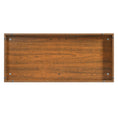 Load image into Gallery viewer, Underside view of The Curator Cat Bookshelf in Brown showing the rectangular base and corner hardware