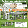 Load image into Gallery viewer, Large outdoor cat enclosure with planter stand and walk-in access in grey and white wooden frame.