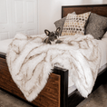 Load image into Gallery viewer, PupProtector Waterproof Throw Blanket white with brown accents on bed; dog lounging on plush throw