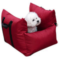 Load image into Gallery viewer, Outbound Travel Portable Car Pet Nest in red with black carrying handles, compact car crate for pets.