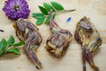 Load image into Gallery viewer, Whole quails (bone-in) by Naked Beasts, three roasted quails on a wooden board.