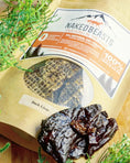 Load image into Gallery viewer, Duck Livers (ABF) Naked Beasts dog treats in kraft packaging with a clear window showing livers
