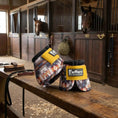Load image into Gallery viewer, Jeffers Expressions No-Turn Bell Boots for Horses, pair, nylon with yellow straps and multicolor geometric pattern.