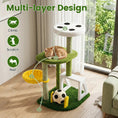 Cargar la imagen en la vista de la galería, Multi-Level Cat Tree by DirectDeals; green turf, white top panel, soccer-field motifs, hammock, cat resting.