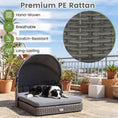 Bild in Galerie-Betrachter laden, Wicker Dog House with Adjustable Canopy & Cushions, grey PE rattan on an outdoor patio.