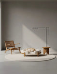 Load image into Gallery viewer, Calming dog bed in cream plush fabric with a light wood frame in a minimalist living space.