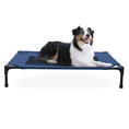 Load image into Gallery viewer, K&H Elevated Dog Bed in blue on a metal frame with a happy dog resting on it