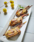 Load image into Gallery viewer, Three whole quails (bone-in) with golden-brown skin on a white rectangular plate