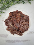 Load image into Gallery viewer, Pork Kidney Thin Cut by Naked Beasts - small animal treats, dried brown slices on plate