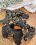 Load image into Gallery viewer, Duck Livers (ABF) from Naked Beasts; dark, dried chunks, multiple pieces on a wooden board
