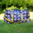 Load image into Gallery viewer, Jeffers Expression Equestrian nylon gear bag duffel with blue geometric pattern and yellow straps.
