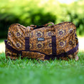 Load image into Gallery viewer, Jeffers Expression Equestrian Nylon Gear Bag in brown floral pattern with purple straps