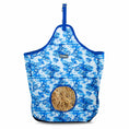Load image into Gallery viewer, Jeffers Expressions top-loading hay bag, 600 denier, blue-and-white toile print with straw visible.