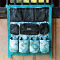 Cargar la imagen en la vista de la galería, Jeffers Expressions trailer-door horse grooming caddy with turquoise frame and black mesh pockets.