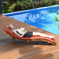 Load image into Gallery viewer, Woman sunbathing on a red cushioned lounge chair on a wooden pool deck beside a blue tiled pool.