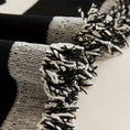 Load image into Gallery viewer, Soft & Cozy Chenille Reversible Sofa Cover by topspet in black and white with fringe.
