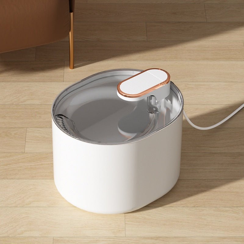 White oval fountain with low outlet