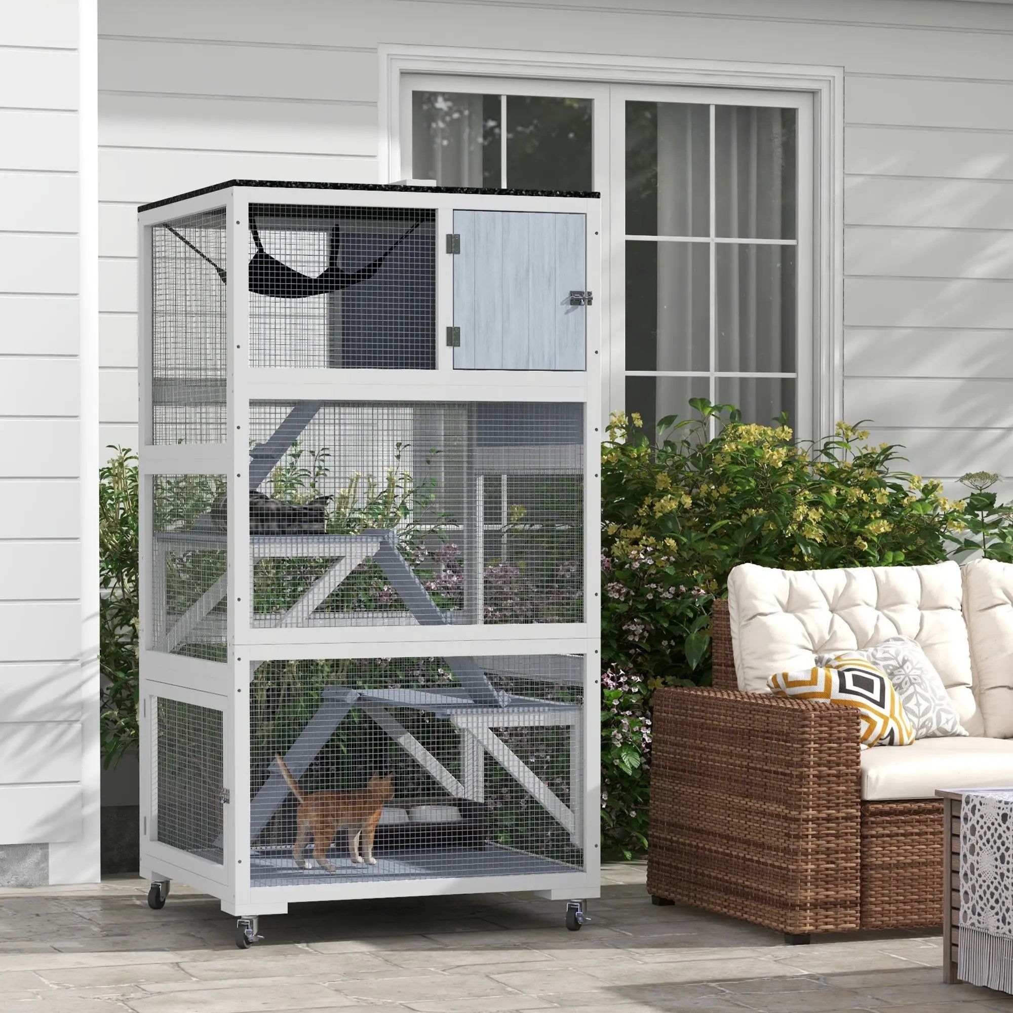 Catio outdoor cat enclosure on wheels in gray with mesh sides and built-in hammock