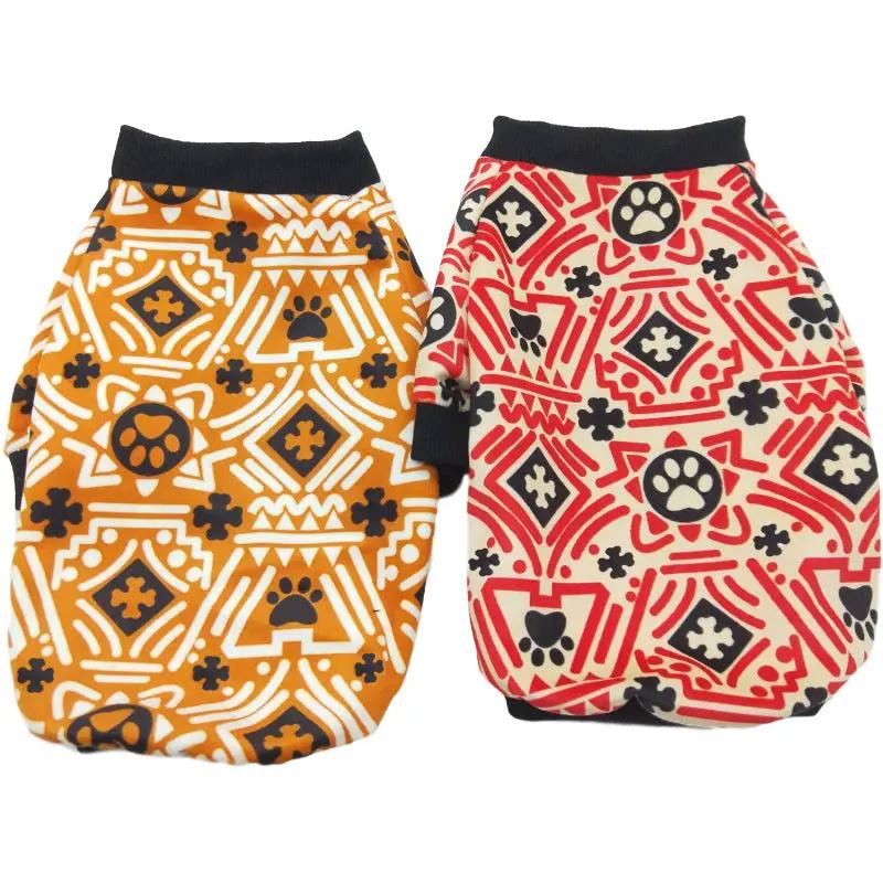 Dog sweaters set of 2 in orange and red with festive geometric and paw-print patterns