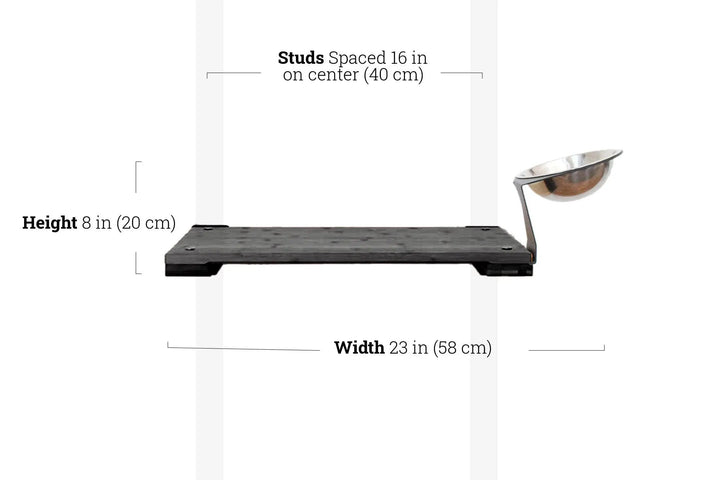 Wall-mounted cat feeding shelf by Catastrophic Creations with dark wood platform and stainless steel bowl
