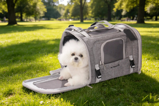 Mr. Peanut's Monterey Series horizontal backpack pet carrier in grey with a mesh panel and a white fluffy dog peeking out.