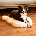 Load image into Gallery viewer, Paw.com PupRug faux fur orthopedic dog bed, curve white with brown accents, shown with a happy dog
