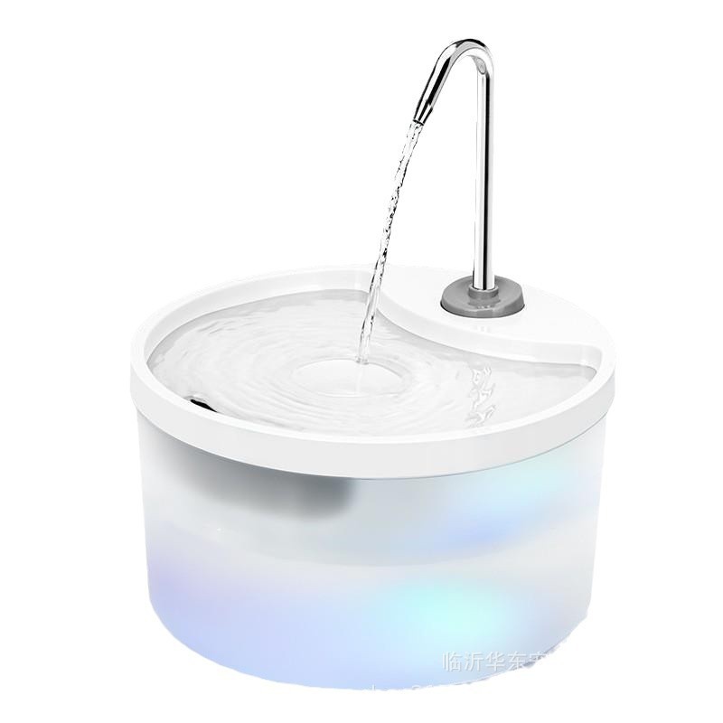 White round fountain with curved spout