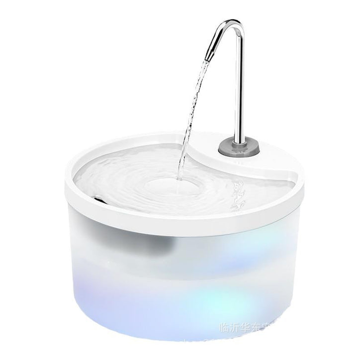 White round fountain with curved spout