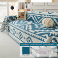 Load image into Gallery viewer, topspet Boho-Chic All-Season Sofa Cover on an armchair; blue/white geometric pattern, pet-proof
