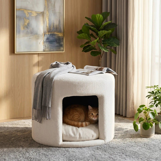Beige Home Furnishers ottoman with removable cushion and hidden pet nook; cat inside.