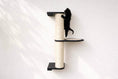 Charger l'image dans la visionneuse de la galerie, Wall Mounted Cat Climbing Pole - Sisal, a cat scratcher with a sisal-wrapped post and black platforms.
