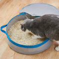 Load image into Gallery viewer, Mr. Peanut's PortaPotty litter box for traveling cats, gray with blue trim, filled with litter pellets, cat inside
