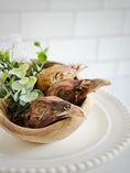 Carica l'immagine nel visualizzatore della galleria, Pheasant heads, dried, in a wooden bowl with greenery
