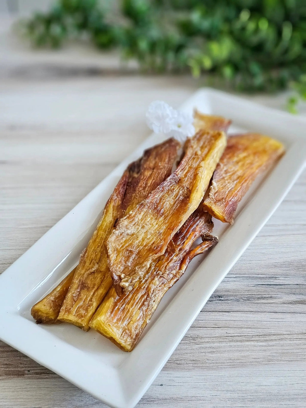 Beef backstrap treats by Naked Beasts, grass-fed and finished with fat trimmed, on a white plate