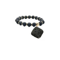 Load image into Gallery viewer, The Black Volcanic Diffuser Charm for Bark Fifth Avenue dog collars; black lava beads with gold spacers.
