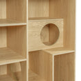 Bild in Galerie-Betrachter laden, Modern 2-in-1 wooden cat house bookshelf with a circular cutout in natural oak finish.
