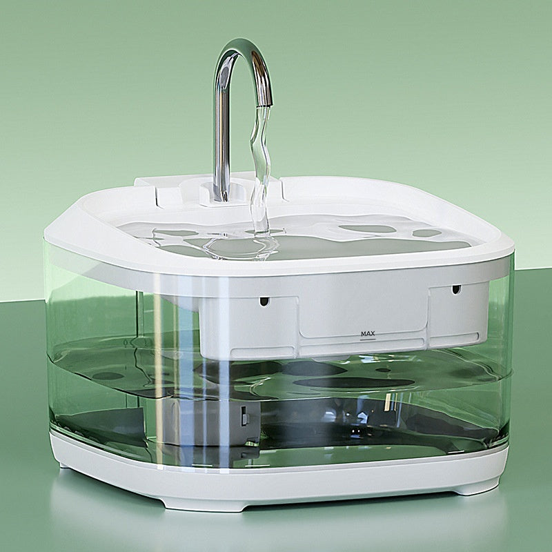 White-trim transparent fountain with curved faucet