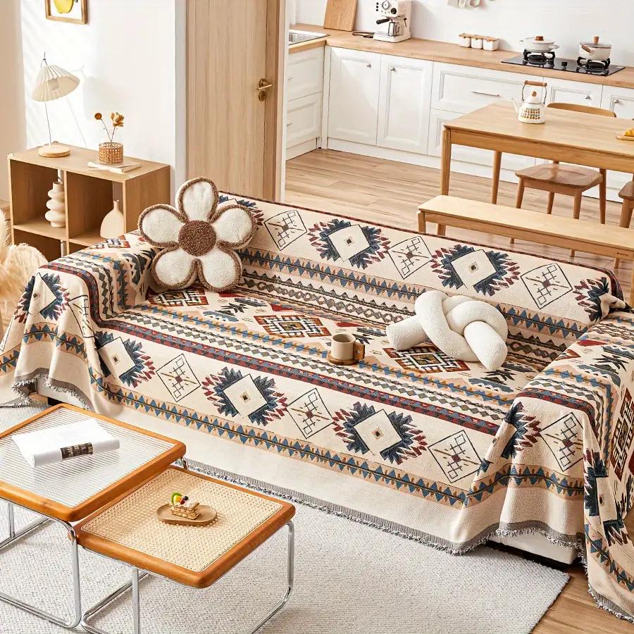 Extra Large Sofa Cover by topspet, stretchable protector in beige geometric pattern on a sofa with two pillows