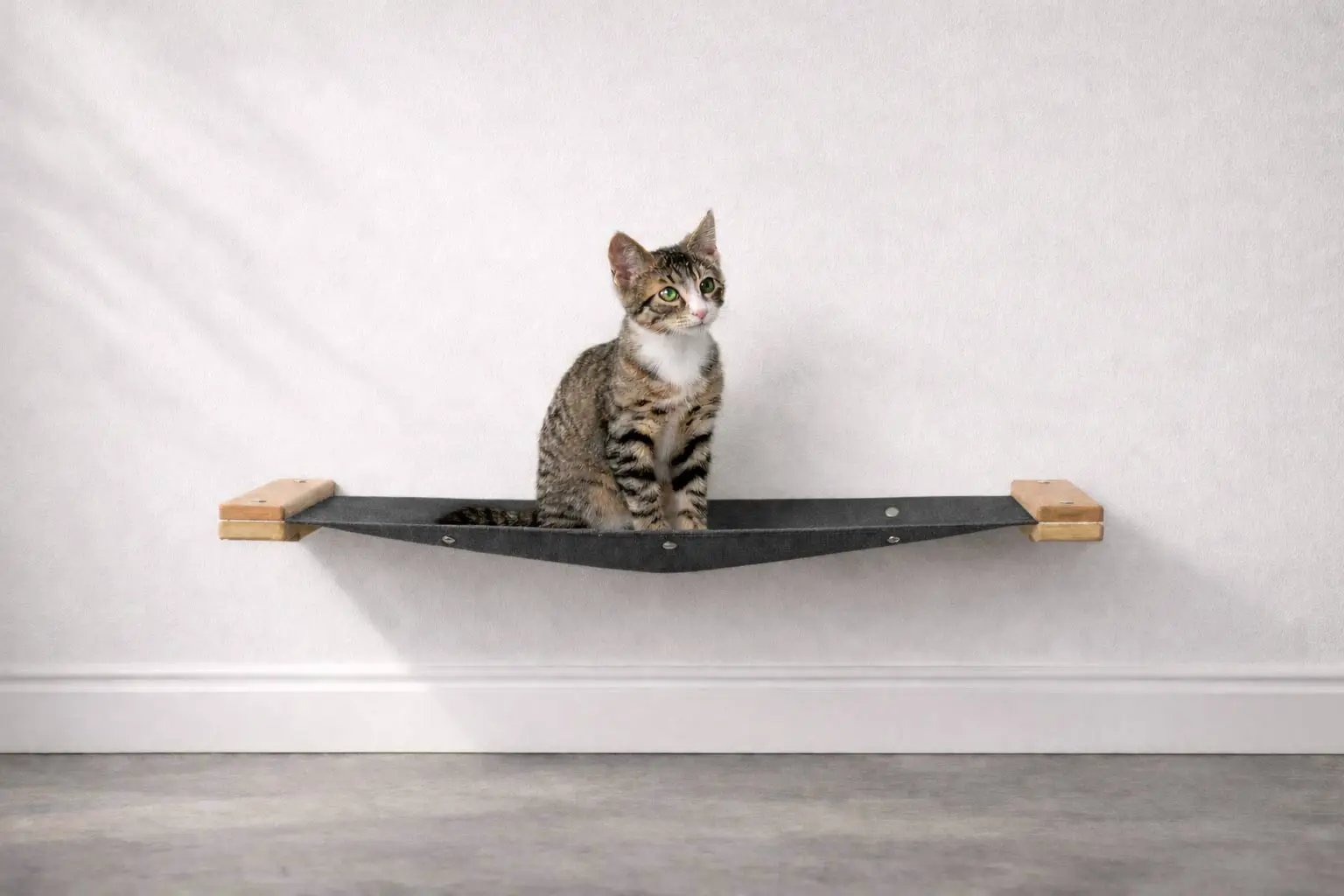 Hanging Cat Bed Hammock in dark gray fabric with wooden ends by Catastrophic Creations