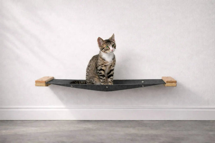Hanging Cat Bed Hammock in dark gray fabric with wooden ends by Catastrophic Creations