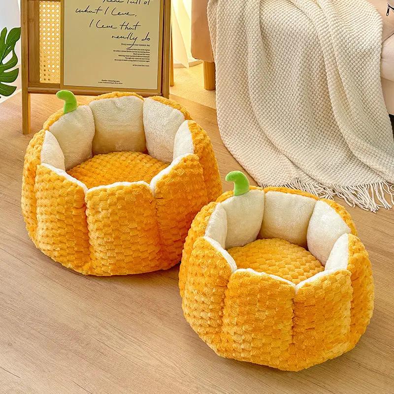 Pumpkin nest pet bed; orange plush exterior with cream interior, set of two pumpkin-shaped cat/dog beds.