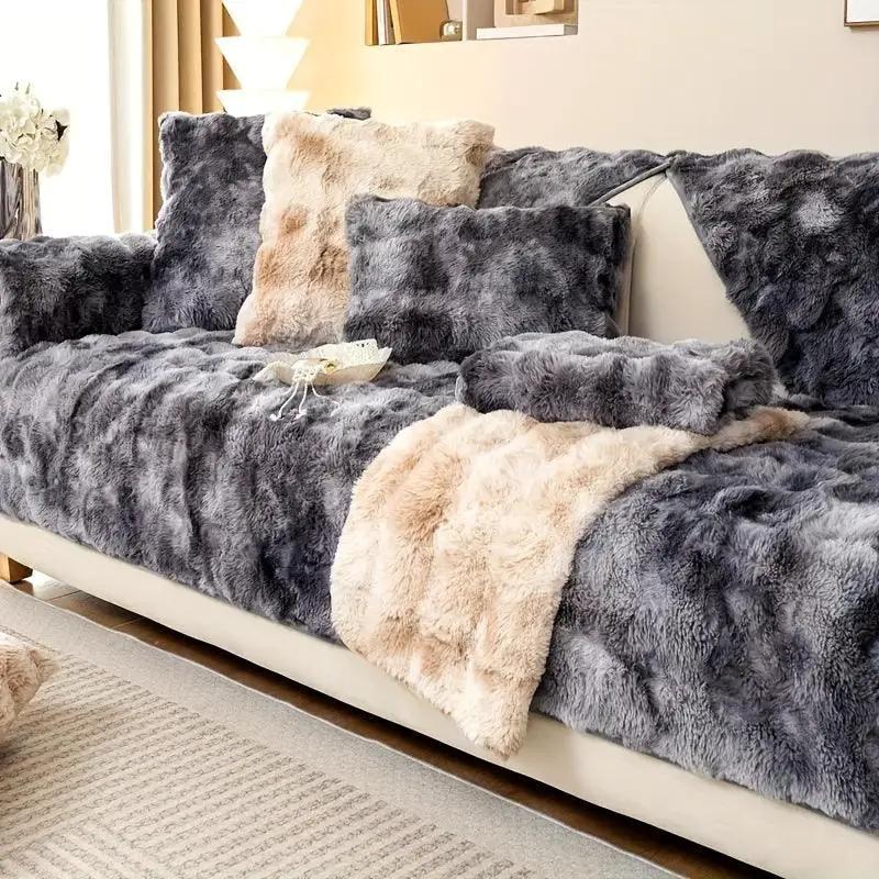 Luxurious gradient velvet sofa cover by topspet on a plush grey-beige sofa with fur cushions.