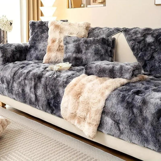 Luxurious gradient velvet sofa cover by topspet on a plush grey-beige sofa with fur cushions.